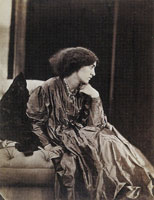 Albumen print by Emery Walker of a photograph by John Robert Parsons Jane Morris seated on a divan, three-quarter-length