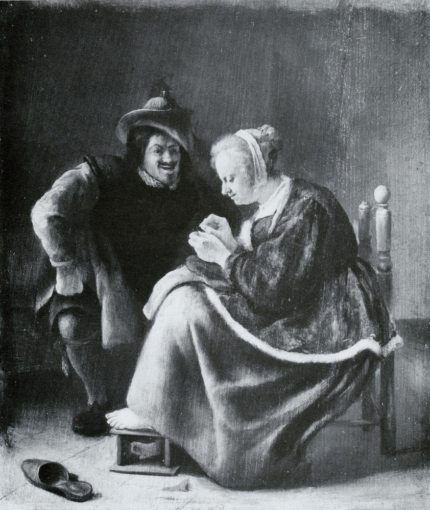 Follower of Jan Steen - A woman mending a stocking