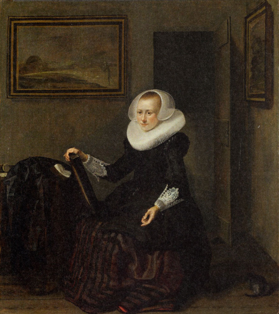 Pieter Codde - A Seated Woman holding a Mirror
