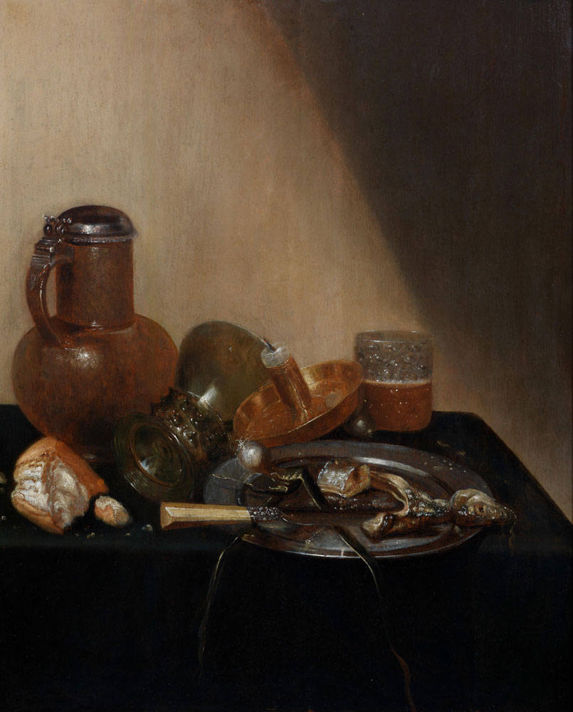 Willem Gabron - A still life of a pewter-mounted stoneware jug, an overturned roemer, a broken roll of bread, a candle in a brass stand, a glass beaker of beer, a pewter dish of fish and a knife with an ivory handle on a draped table-top