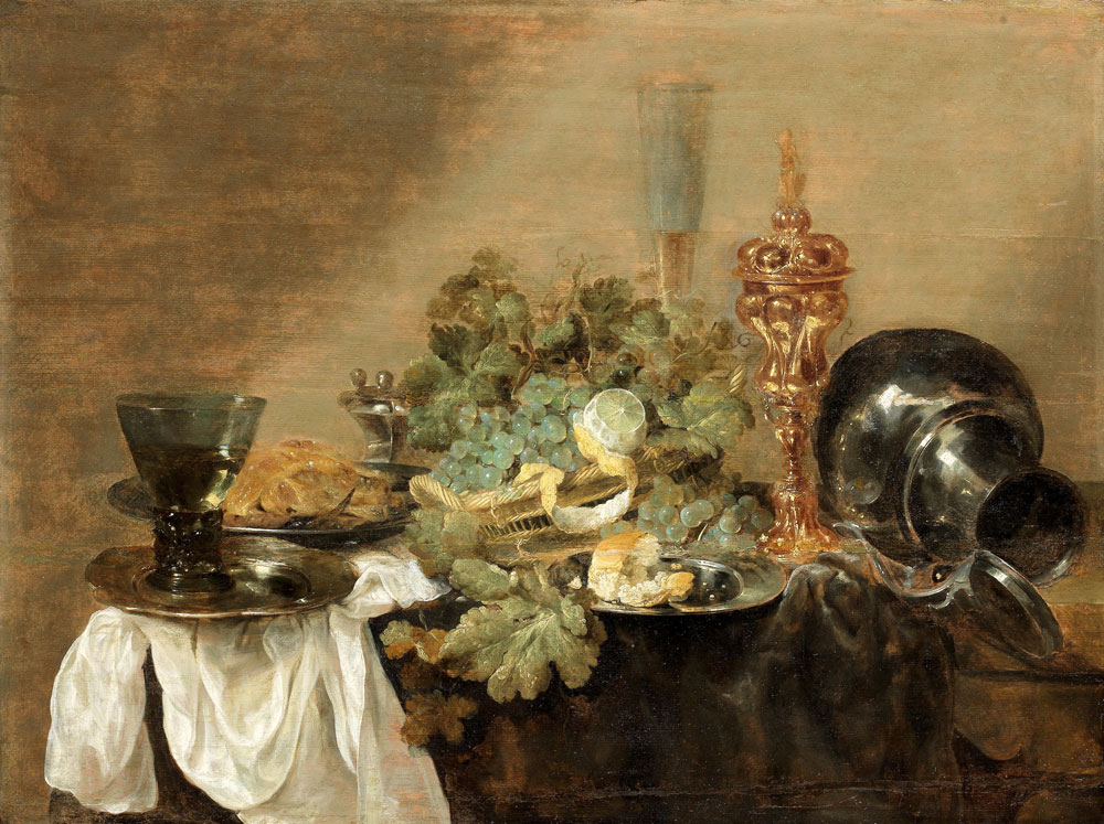 Abraham Hendricksz. van Beijeren - Grapes and a peeled lemon in a basket with bread, dressed crab and a roemer of wine on pewter plates, together with a gilt cup and cover, and a pewter flagon upon a draped table-top