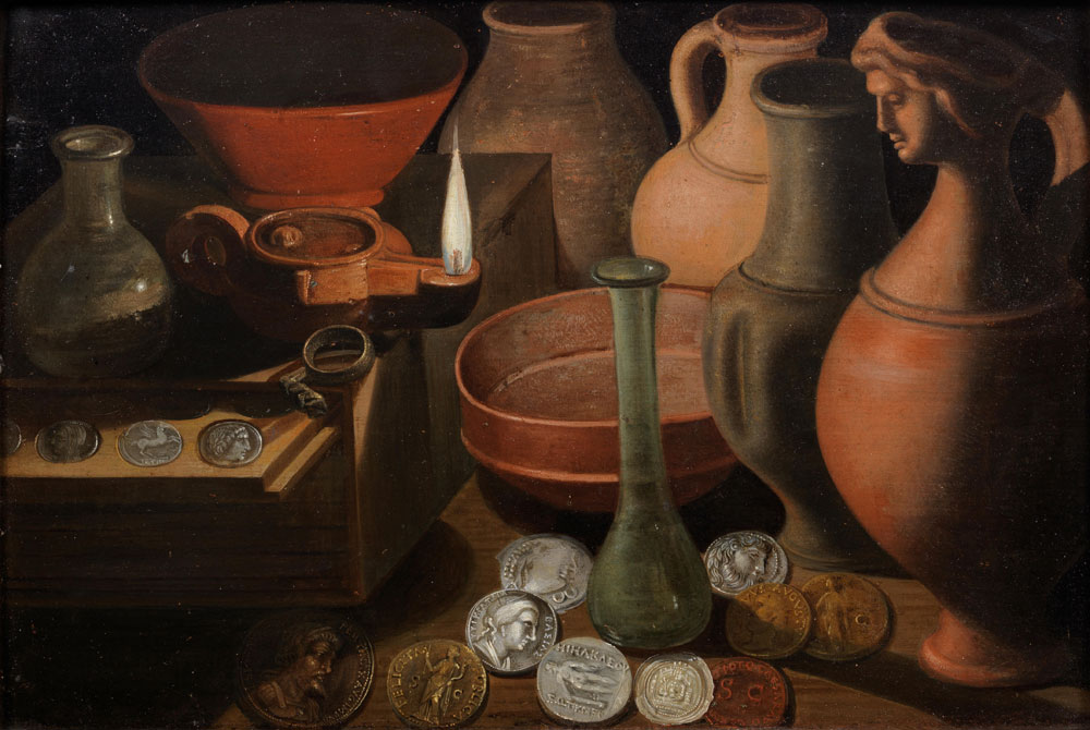 German School - Ancient coins, glasswear and pots on a table-top with an oil lamp