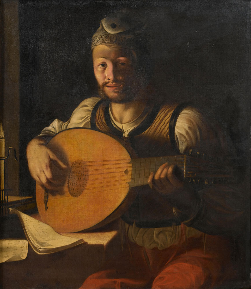 Angelo Caroselli - A young man playing a lute by candlelight